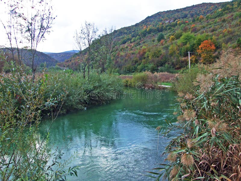The upper part of the river Korana and below the Plitvice Lakes National Park, Croatia Gornji dio toka rijeke Korane. I podno nacionalnog parka Plitvicka jezera stock image The upper part of the river Korana and below the Plitvice Lakes National Park, Croatia Gornji dio toka rijeke Korane. I podno nacionalnog parka Plitvicka jezera stock image