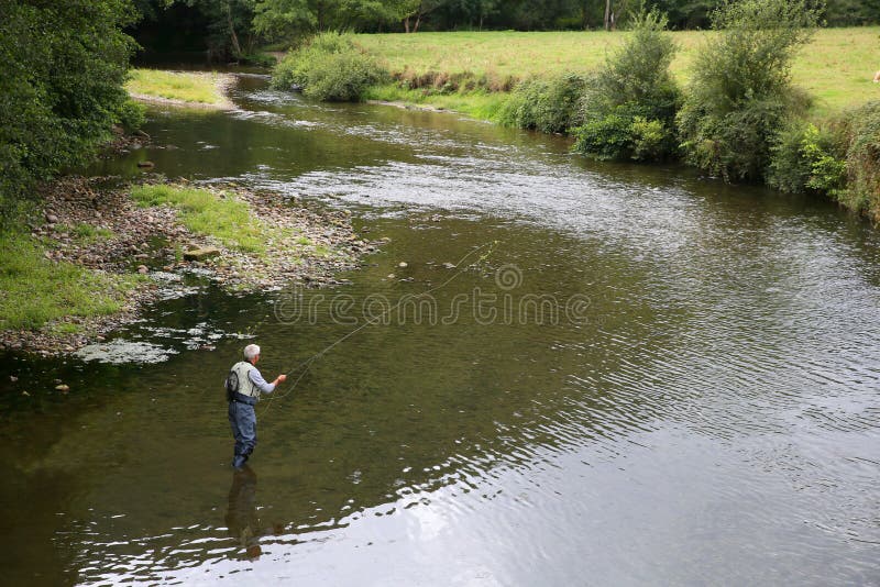Upper view of fisherman in the river royalty free stock photos