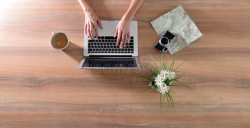 Upper view of laptop coffee camera hands royalty free stock images
