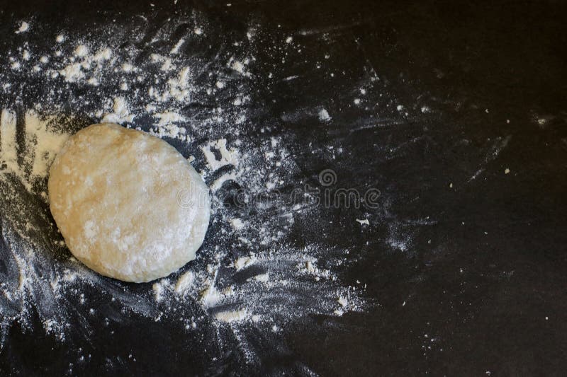 Upper view of a risen yeast dough for pizza or bread royalty free stock photos