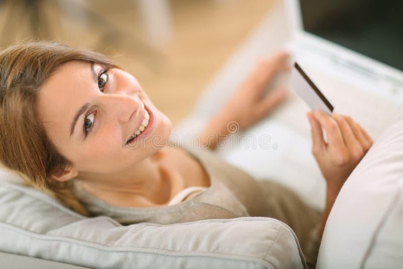 Upper view of woman shopping online from home stock photo