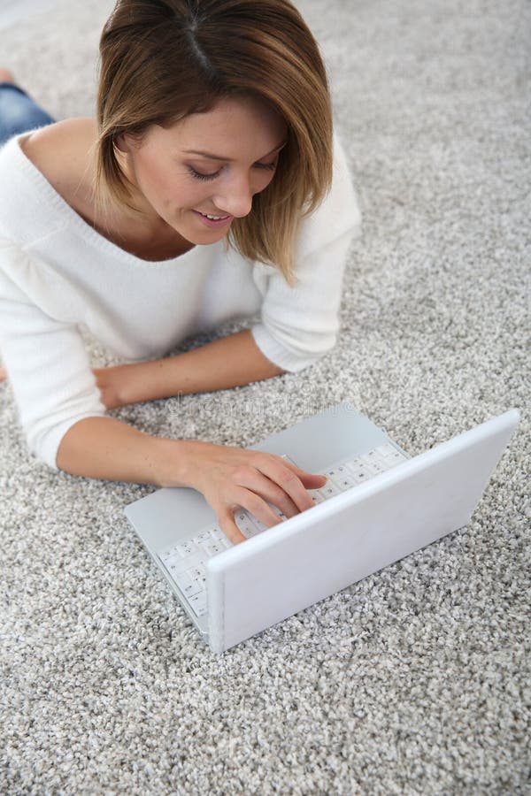 Upper view of woman typing on laptop royalty free stock photo