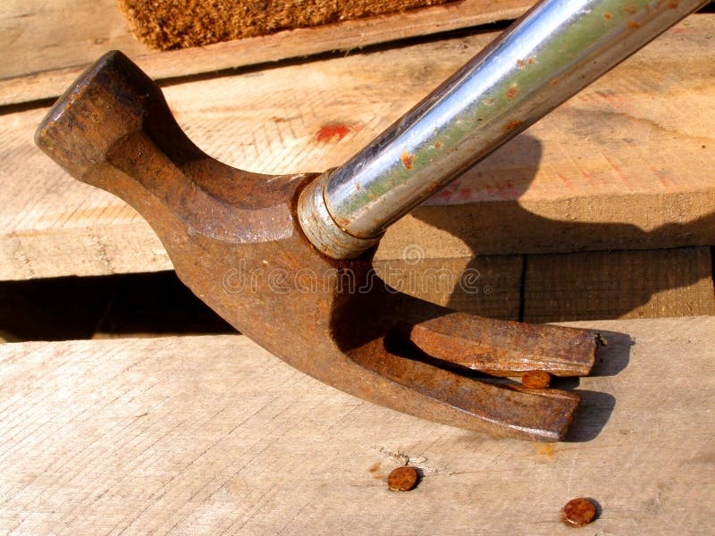 Detail photo composition of the claw hammer in action. Detail photo composition of the claw hammer in action