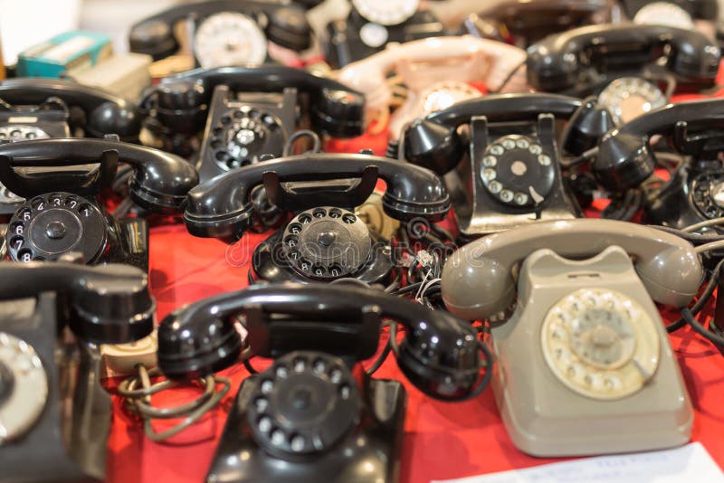 Set of Antique Telephones on a Table: Vintage Objects. Set of Antique Telephones on a Table: Vintage Objects.