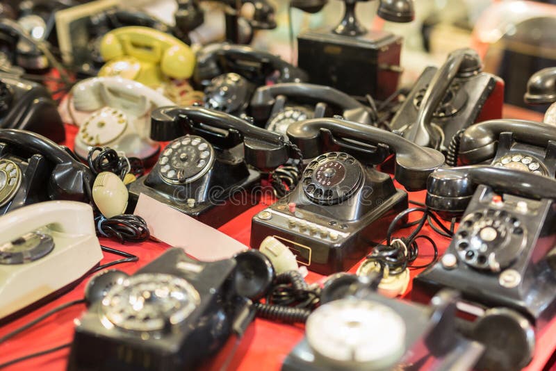 Set of Antique Telephones on a Table: Vintage Objects. Set of Antique Telephones on a Table: Vintage Objects.