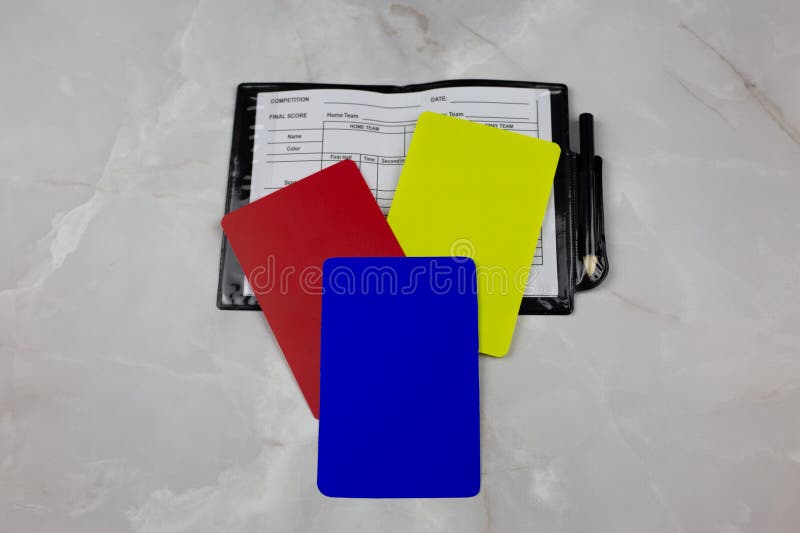 Blue card in football, set of referee cards of three different colors, changes in football regulations, new rules with blue card. Blue card in football, set of referee cards of three different colors, changes in football regulations, new rules with blue card