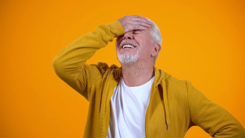 Upset aged man demonstrating face-palm gesture, failure sign, elderly loser stock photos Upset aged man demonstrating face-palm gesture, failure sign, elderly loser stock photos