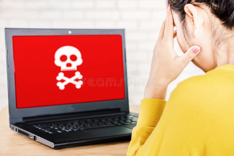 Upset Asian business woman with computer screen showing virus warning alert, hacking,piracy and security concept stock photos Upset Asian business woman with computer screen showing virus warning alert, hacking,piracy and security concept stock photos