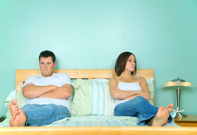 Upset Caucasian Couple Not Getting Along In Bed