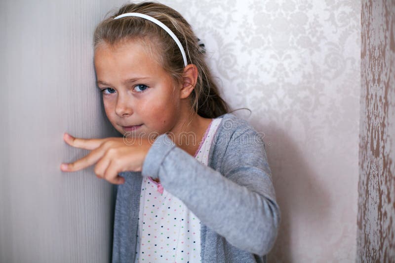 Upset Girl Playing with Her Fingers Stock Photo - Image of stymie, home ...