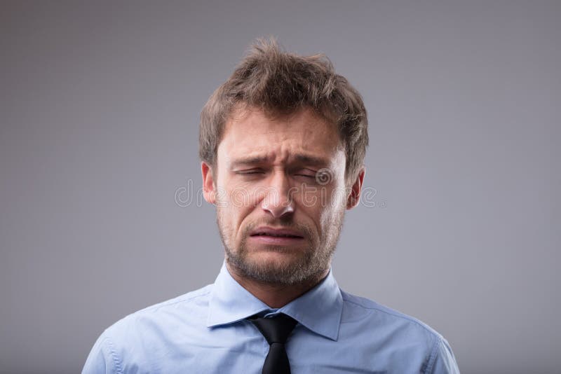 Upset man about to burst into tears stock photos