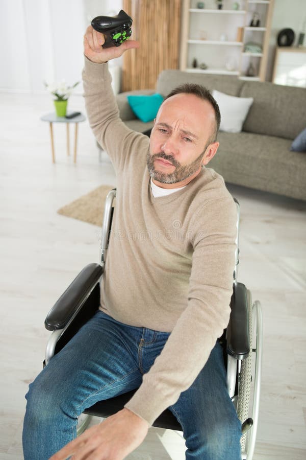 Upset Man on Wheelchair Playing Video Games Stock Image Image of