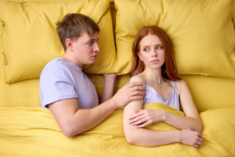 Upset Young Man Demands Sex from Wife, Woman Refuses, Offended Stock Photo 
