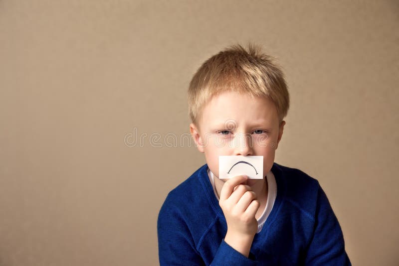 Upset sad young boy (teen) goes to stress, negative mood. Portrait with copy space