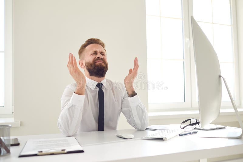 Upset Tired Businessman Raised His Hands Up Looking At A Computer At A