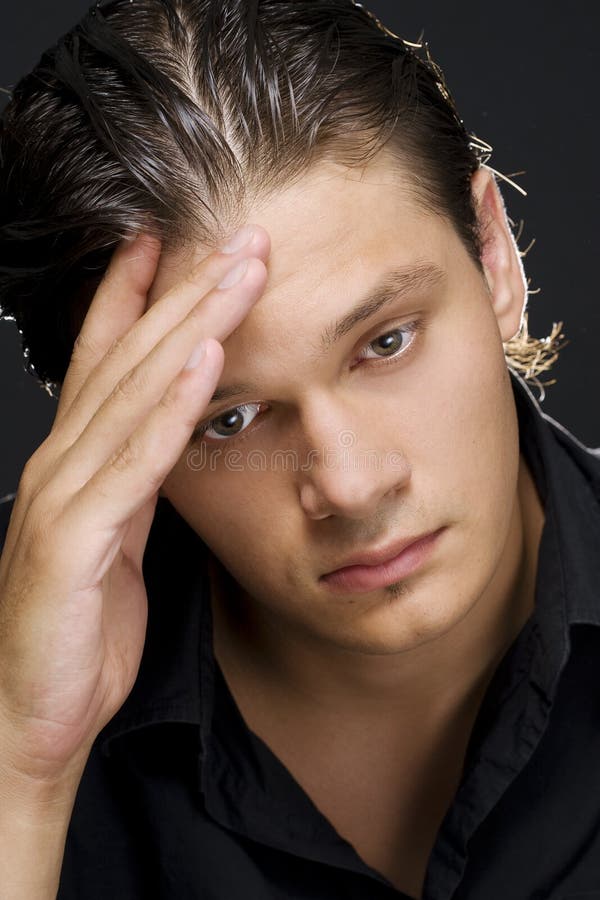 Upset young man stock photos