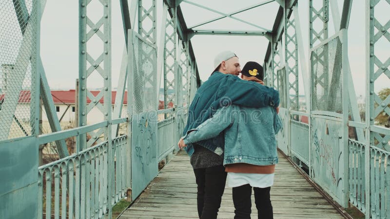 Urban Love Story. Date Boyfriend And Girlfriend On The Bridge.