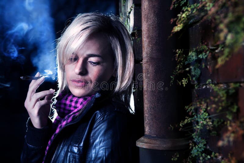 Urban portrait of a young woman royalty free stock images
