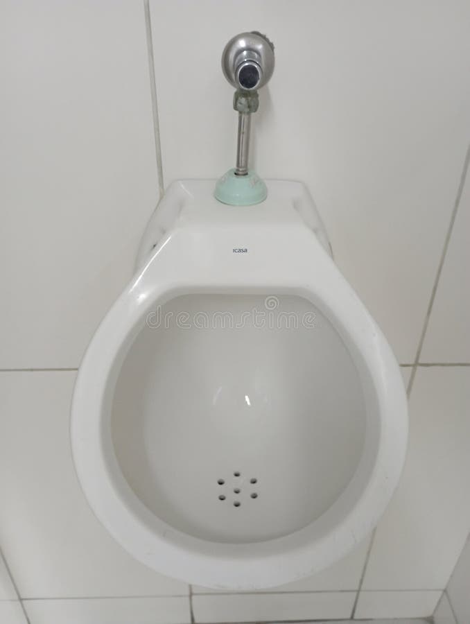 A Urinal in a White Male Public Restroom Stock Photo Image of male