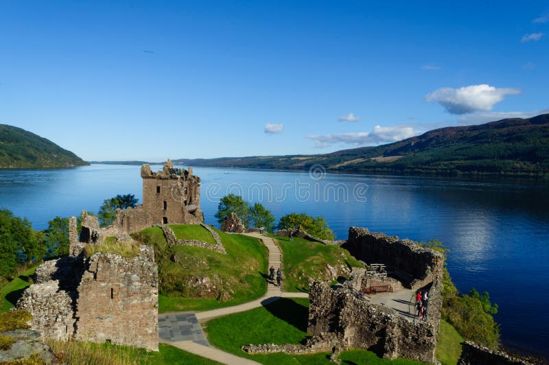 Urquhart Castle in the summer with a beautiful blue sky