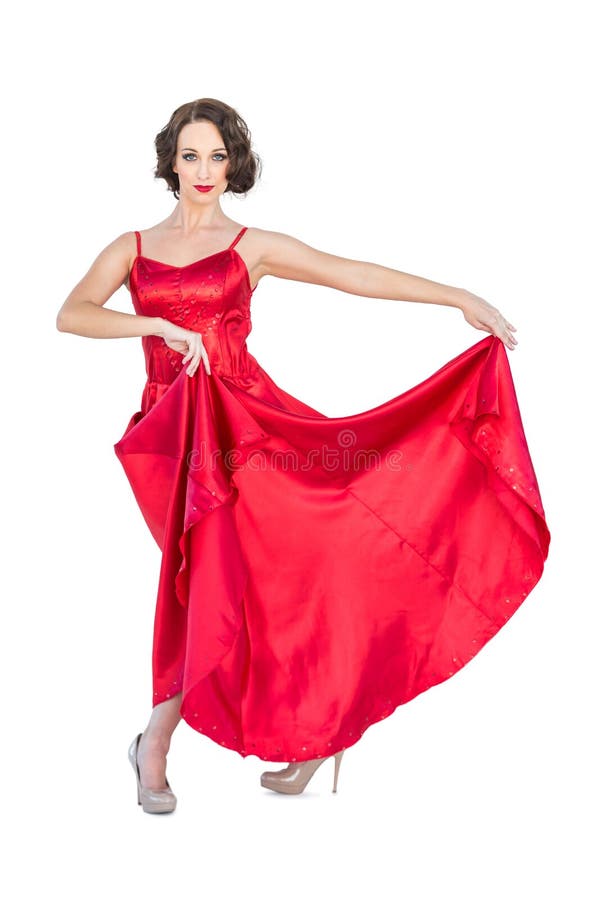 Ursnygg flamencodansare som poserar rymma hennes klänning arkivfoton Ursnygg flamencodansare som poserar rymma hennes klänning arkivfoton