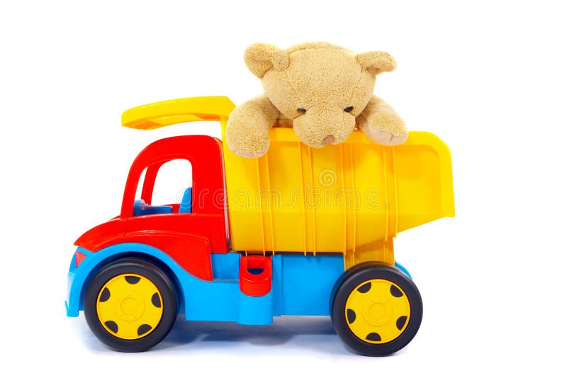 Urso e caminhão do brinquedo