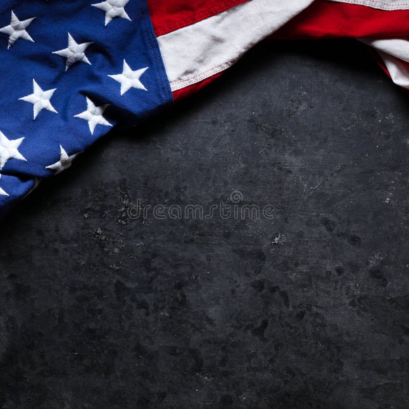US American flag on worn black background. For USA Memorial day, Veteran`s day, Labor day, or 4th of July celebration. With blank space for text stock photography US American flag on worn black background. For USA Memorial day, Veteran`s day, Labor day, or 4th of July celebration. With blank space for text stock photography