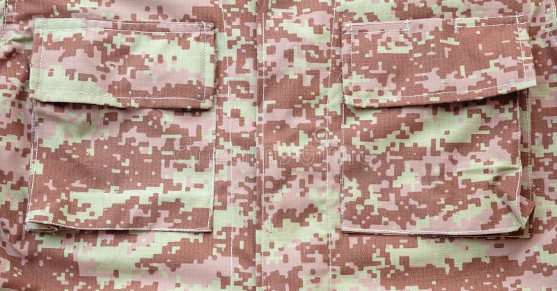 US army camouflage uniform detail background, closeup view royalty free stock photography