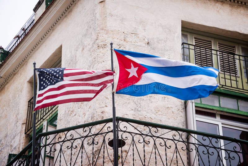 US and Cuban flags side by side in Havana stock images