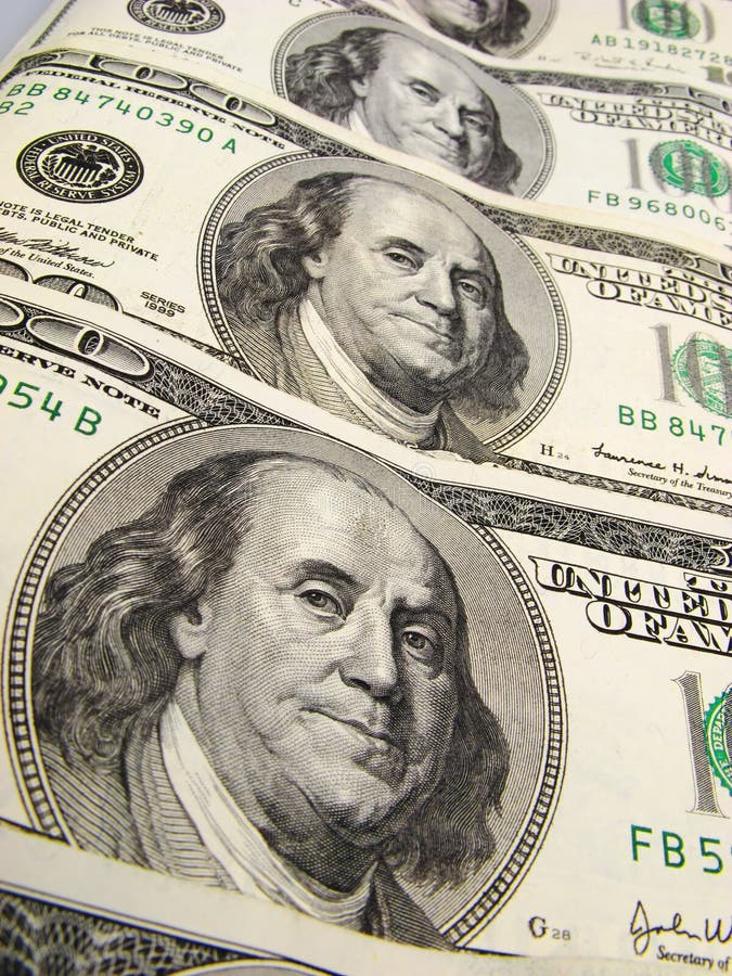 US dollar banknotes on light background