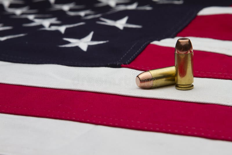US Flag and two bullets