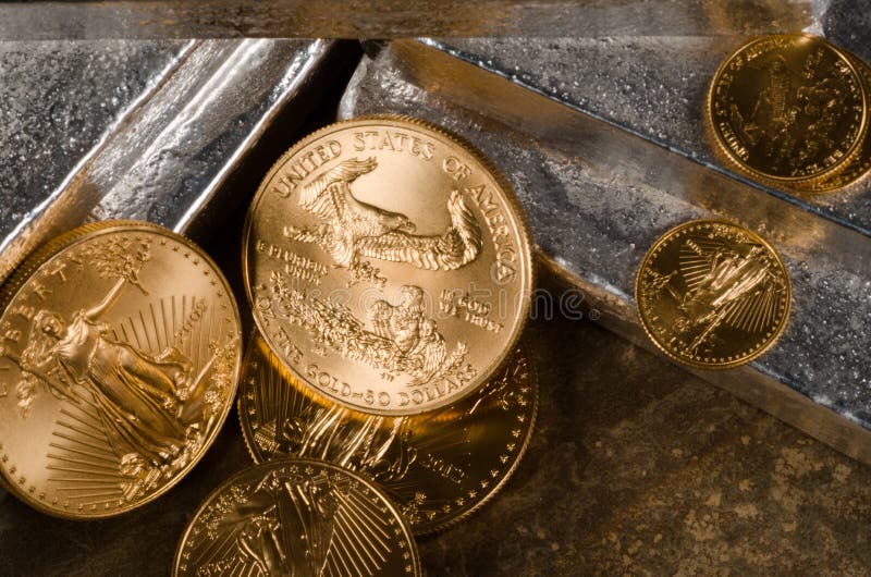 US Gold Eagles on Silver Bars royalty free stock photography