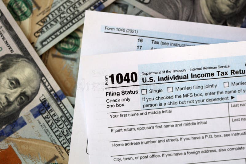 us-1040-individual-income-tax-return-form-with-100-dollar-bills