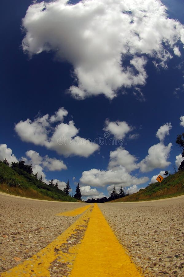 Interstate road with blue mackerel sky. Perspective ant stock images, royalty-free photos and pictures