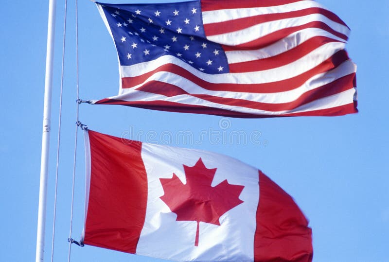 USA and Canadian Flags at the Canadian American border