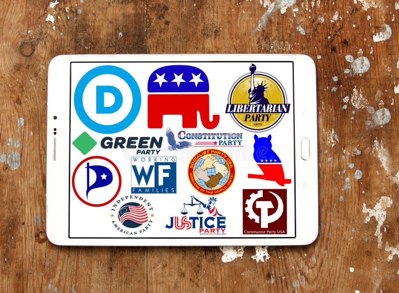 Collection of logos, vector and emblem of top election parliamentary political parties for the united states on white tablet on rusty wooden background. Collection of logos, vector and emblem of top election parliamentary political parties for the united states on white tablet on rusty wooden background