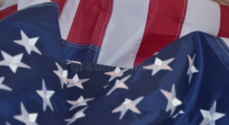USA flag, close-up. Studio shot. USA flag background. Stars displaying on waving American flag in filled frame layout. This is my original photography. Hight resolution