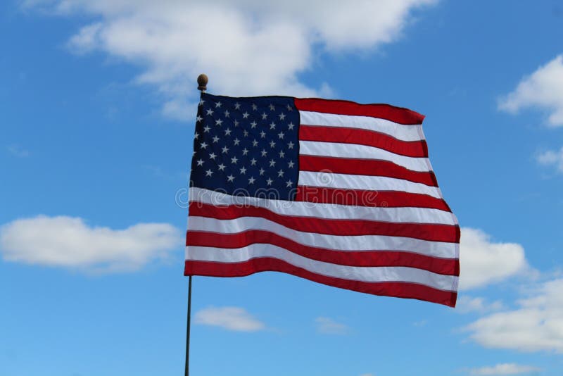 American flag flying in the wind stock photography American flag flying in the wind stock photography