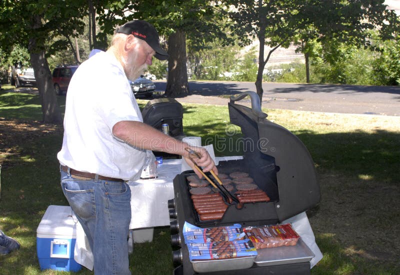 LEWISTON / IDAHO STATE/ USA . Uniontown male George Dennler grilling food for family reunion today 17 July 2010 (PHOTO BY FRANCIS JOSEPH DEAN / DEAN PICTURES). LEWISTON / IDAHO STATE/ USA . Uniontown male George Dennler grilling food for family reunion today 17 July 2010 (PHOTO BY FRANCIS JOSEPH DEAN / DEAN PICTURES)