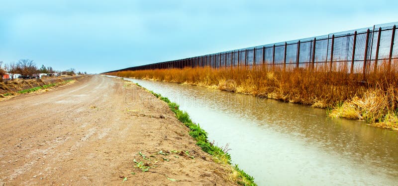 On the US border fence to Mexico at El Paso. On the US border fence to Mexico at El Paso