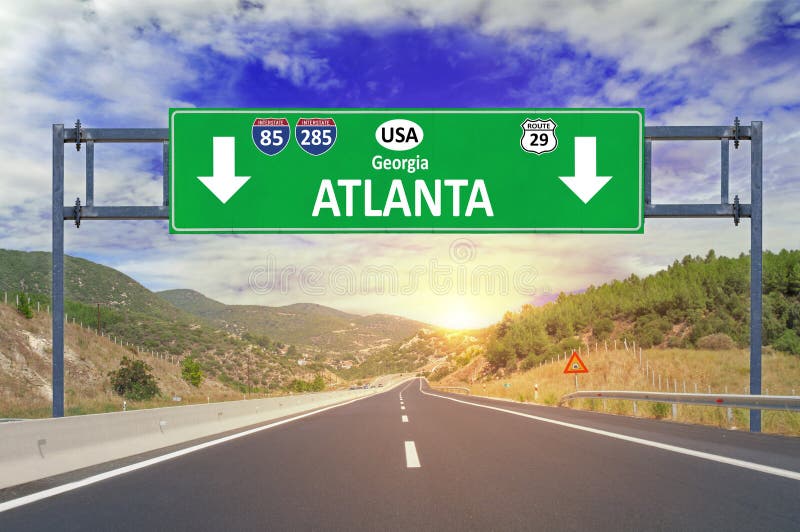 US city Atlanta road sign on highway close. US city Atlanta road sign on highway close