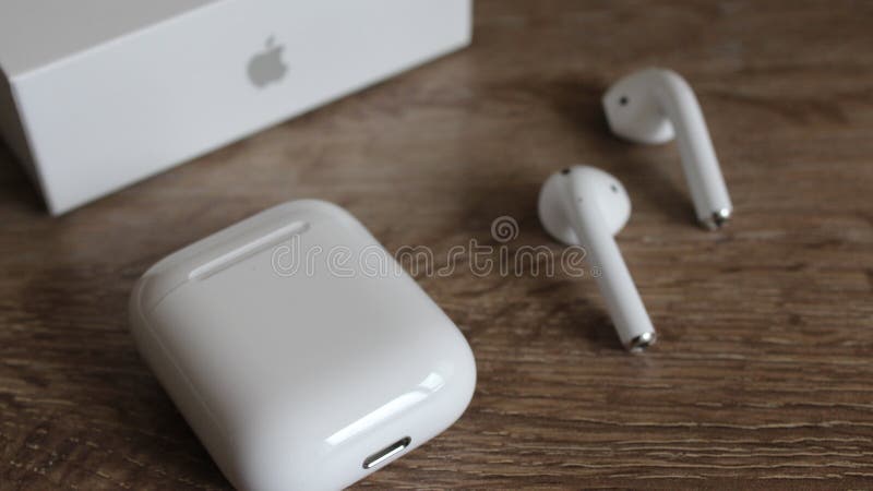 Distraction cease Separate USA - OCTOBER 07, 2020: Apple AirPods Wireless Bluetooth Headphones  Unboxing with a Microphone for Apple IPhone. New Apple Earpods Editorial  Stock Image - Image of spruce, tree: 187421359