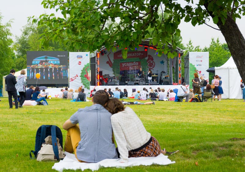 MOSCOW - JUNE 20, 2015: People attend open-air concert on XII International Jazz Festival Usadba Jazz in Tsaritsyno Park on June 20, 2015 in Moscow. MOSCOW - JUNE 20, 2015: People attend open-air concert on XII International Jazz Festival Usadba Jazz in Tsaritsyno Park on June 20, 2015 in Moscow