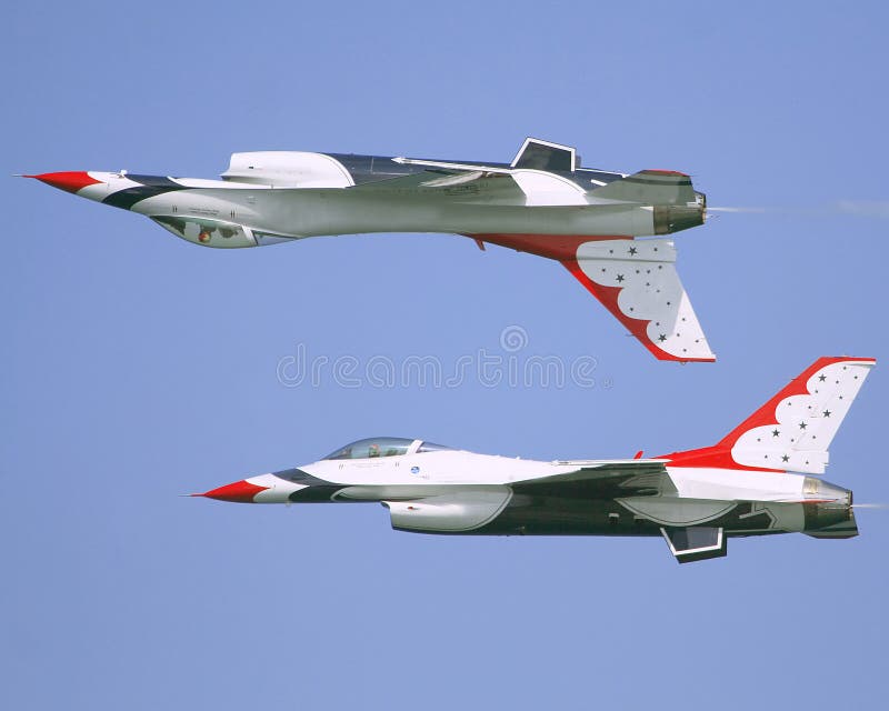 2 F16 Thunderbirds in a aerial display involving the downside up maneuver. The F-16 Fighting Falcon is a multirole jet fighter aircraft developed by General Dynamics and Lockheed Martin in the United States. Designed as a lightweight fighter, it evolved into a successful multirole aircraft. The Thunderbirds are the Air Demonstration Squadron of the United States Air Force. As such, they tour the United States and much of the world, performing aerobatic formation and solo flying in specially-marked USAF jet aircraft. Officers serve a two-year assignment with the squadron, while enlisted personnel serve three to four. Replacements must be trained for about half of the team each year, providing a constant mix of experience. The squadron performs no more than 88 air demonstrations each year and has never canceled a demonstration due to maintenance difficulty. In addition to their air demonstration responsibilities, the Thunderbirds are part of the USAF combat force and a component of the 57th Wing. If required, the team's personnel and aircraft can be rapidly integrated into a fighter unit at Nellis Air Force Base, Nevada. 2 F16 Thunderbirds in a aerial display involving the downside up maneuver. The F-16 Fighting Falcon is a multirole jet fighter aircraft developed by General Dynamics and Lockheed Martin in the United States. Designed as a lightweight fighter, it evolved into a successful multirole aircraft. The Thunderbirds are the Air Demonstration Squadron of the United States Air Force. As such, they tour the United States and much of the world, performing aerobatic formation and solo flying in specially-marked USAF jet aircraft. Officers serve a two-year assignment with the squadron, while enlisted personnel serve three to four. Replacements must be trained for about half of the team each year, providing a constant mix of experience. The squadron performs no more than 88 air demonstrations each year and has never canceled a demonstration due to maintenance difficulty. In addition to their air demonstration responsibilities, the Thunderbirds are part of the USAF combat force and a component of the 57th Wing. If required, the team's personnel and aircraft can be rapidly integrated into a fighter unit at Nellis Air Force Base, Nevada