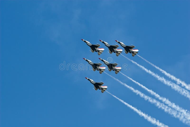 Thunderbirds in F-16's perform at an air show. Thunderbirds in F-16's perform at an air show