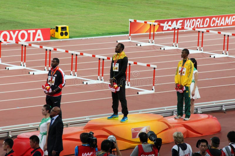 Usain Bolt on top of podium for winning 200 metres world title at the IAAF World Championships Beijing 2015