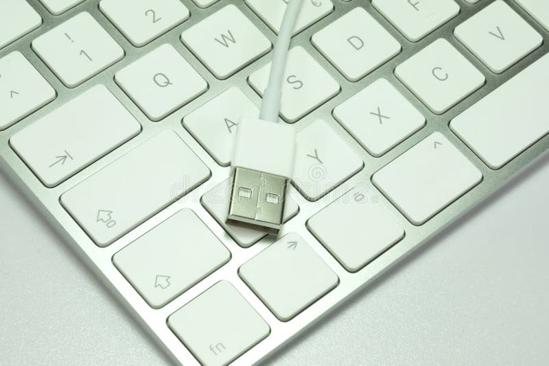 A USB cable and keyboard stock photo. Image of service 137379902