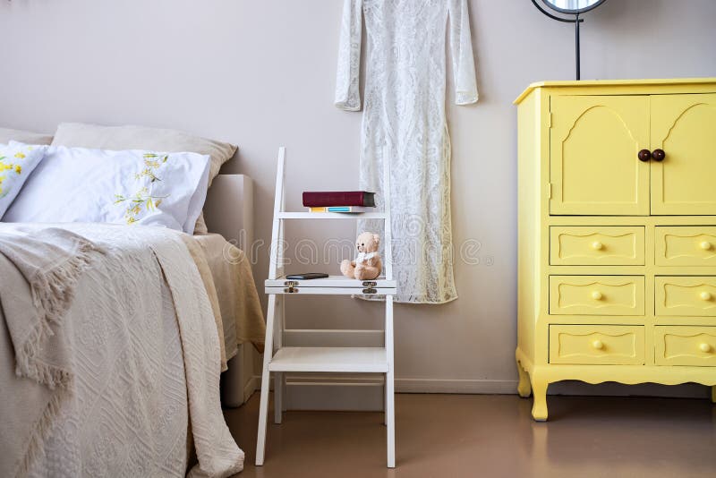 Use of Folding Stepladder Chair in Bedroom Stock Photo Image of