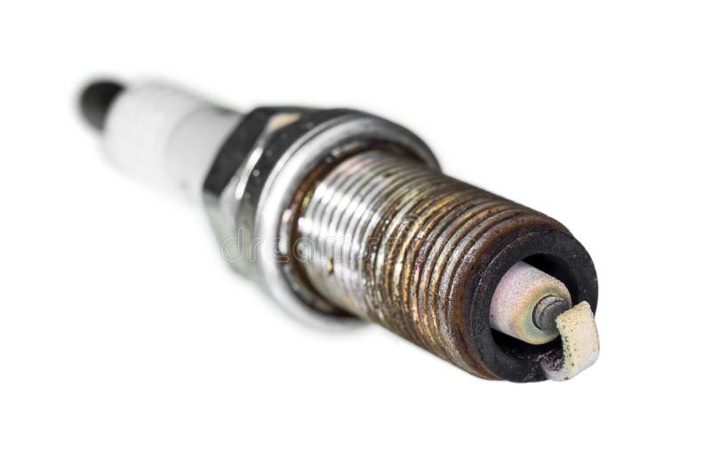 Used burned spark plug over white royalty free stock image Used burned spark plug over white royalty free stock image