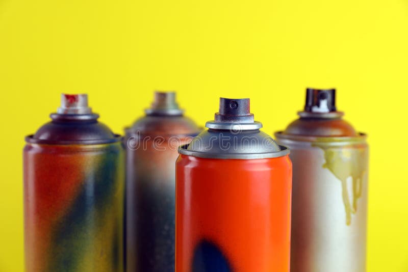 Used Cans of Spray Paints on Yellow Background, Closeup Stock Image Image of design, metal